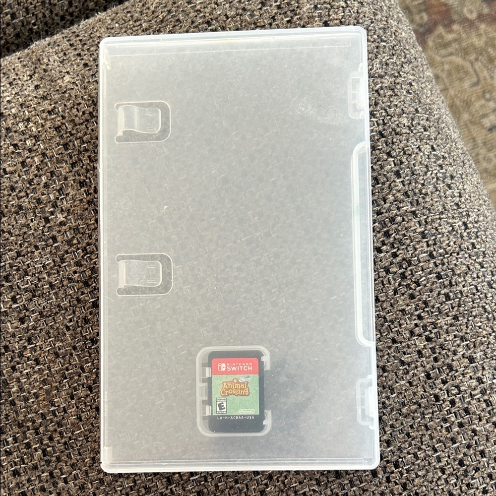 Nintendo Switch Animal Crossing New Horizons Game with case.